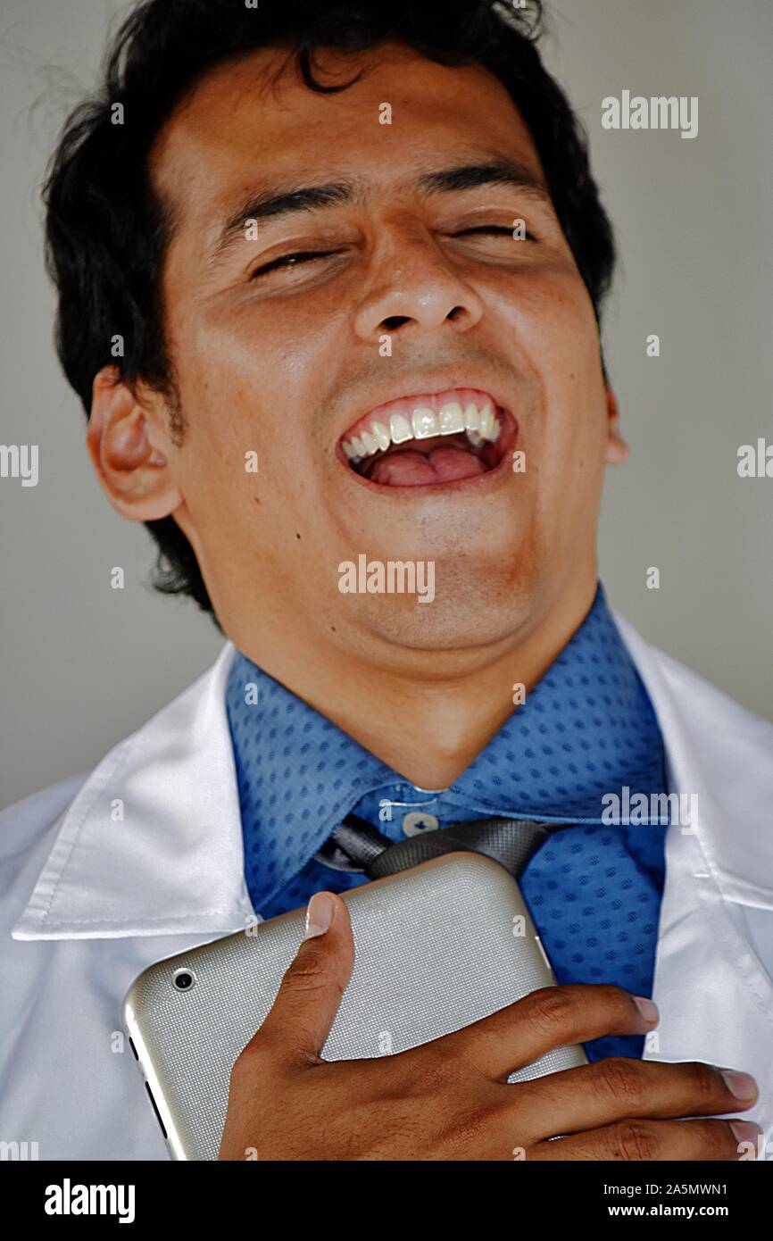 Mature male doctor laughing hi-res stock photography and images - Alamy