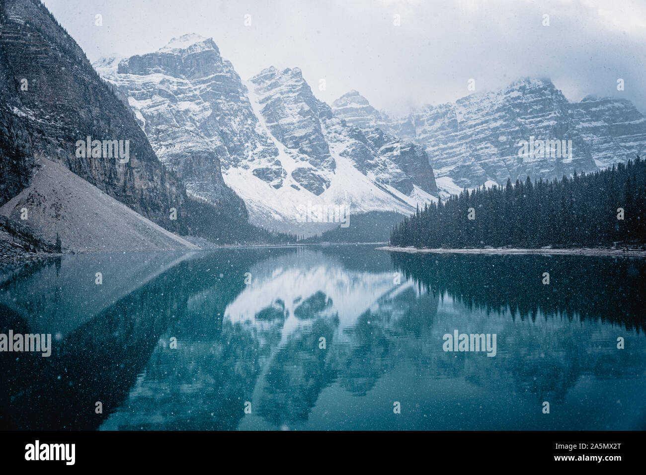 Snowfall at Moraine Lake, Banff National Park, Alberta Canada Stock Photo