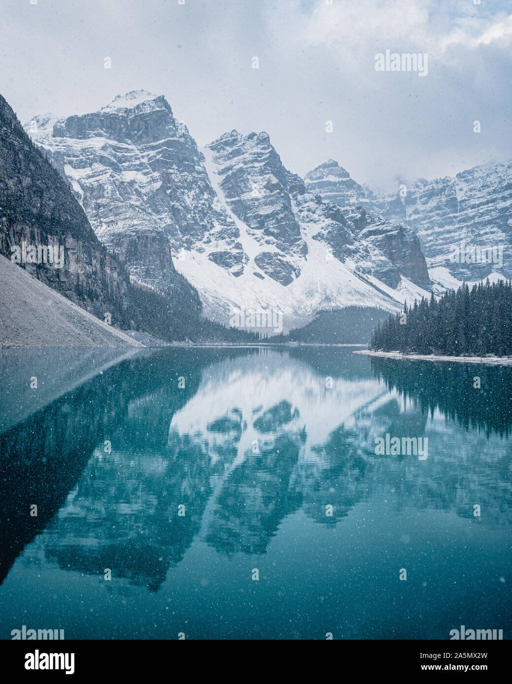 Snowfall at Moraine Lake, Banff National Park, Alberta Canada Stock Photo