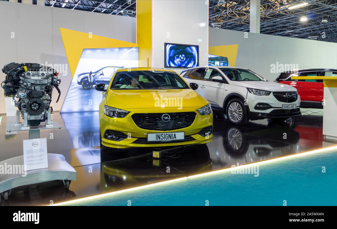 BUDAPEST/HUNGARY - OCTOBER 18, 2019: Automobile technology trade show. New Opel models and engine on display at vendor booth. Stock Photo