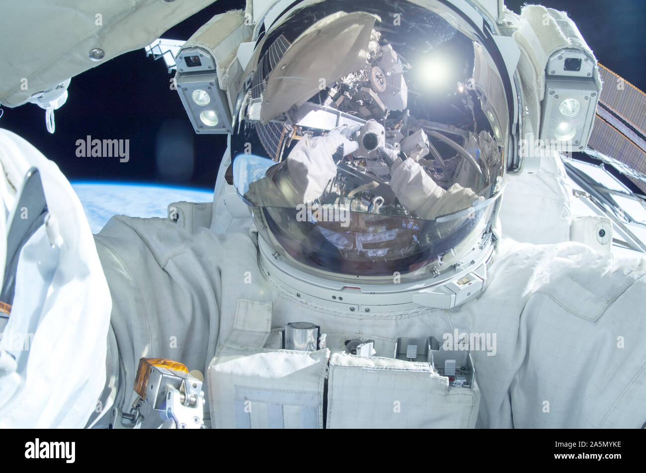 Astronaut in open space above the planet. Elements of this image were furnished by NASA. Stock Photo