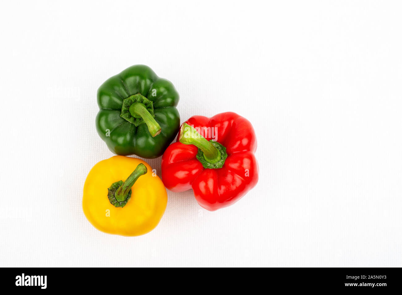 Top view Pepper sweet green red and yellow on the white isolated background Stock Photo