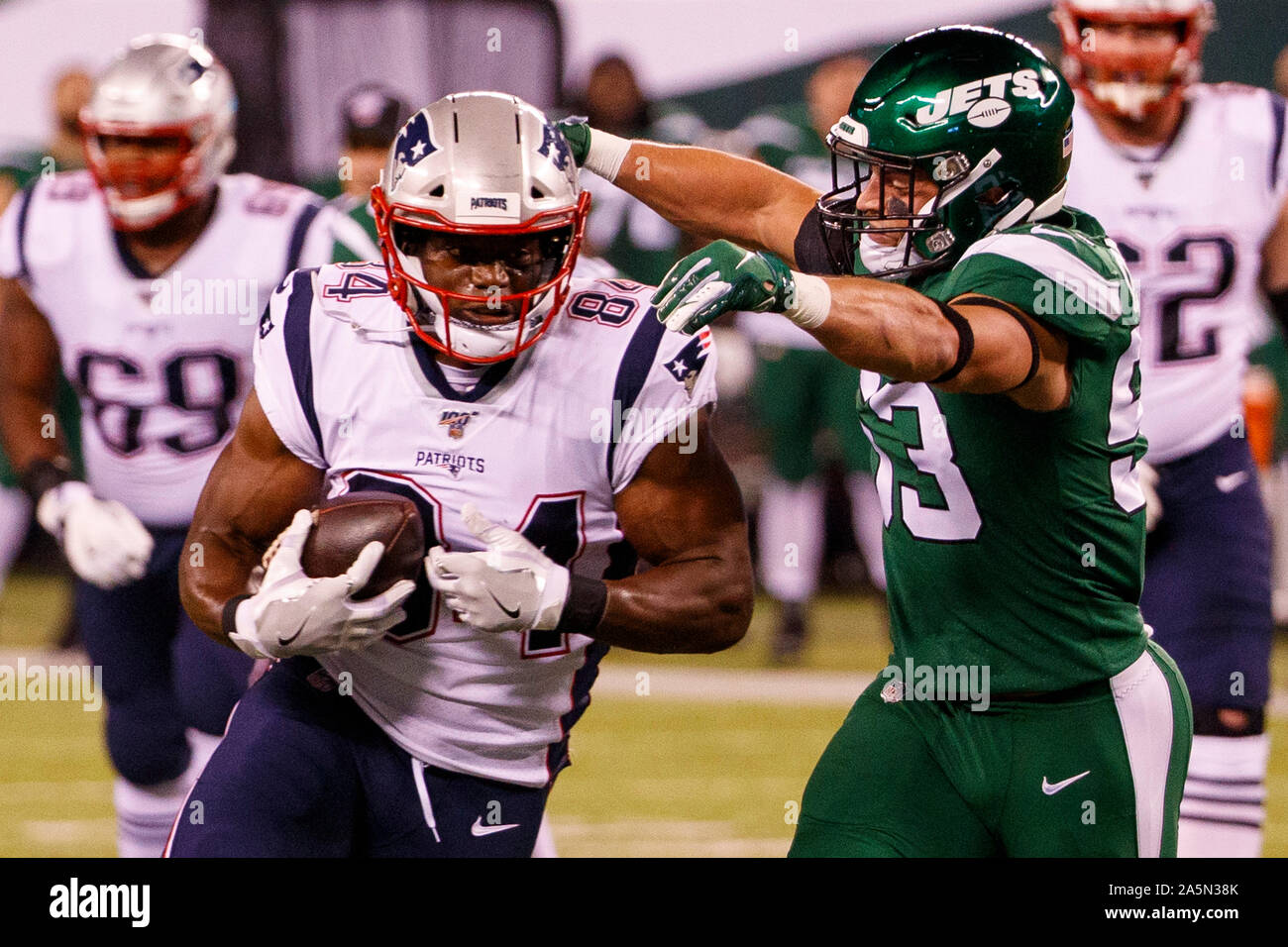 East Rutherford, New Jersey, USA. 21st Oct, 2019. New England Patriots  tight end Benjamin Watson (84) with the catch as New York Jets linebacker Blake  Cashman (53) reaches for him during the