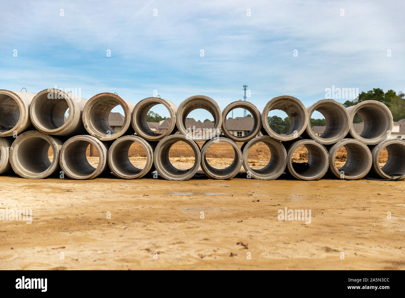 Precast Concrete Drainage pipes stacked up on construction site for new