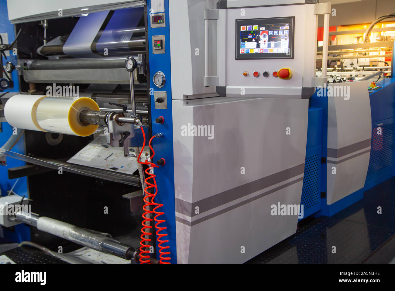 Automatic folder gluer machine in modern printing industry Stock Photo