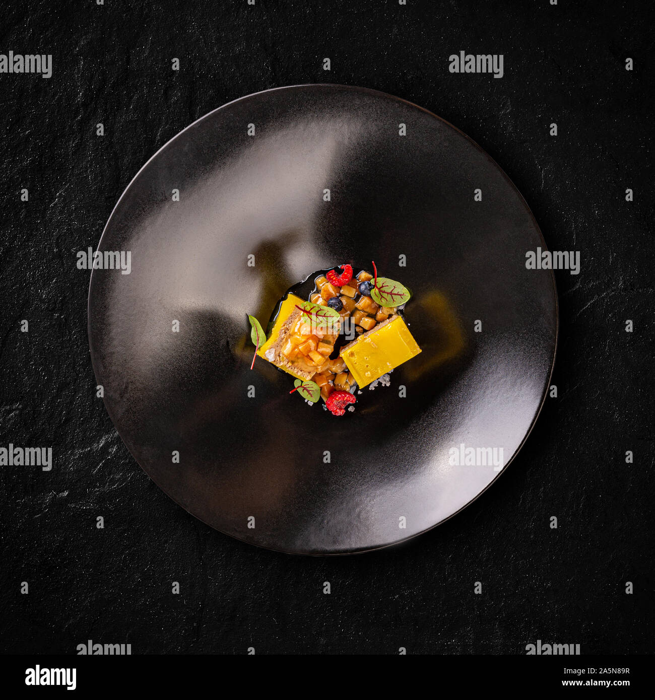 Steamed homemade duck liver pate served with quince in wine-marmalade