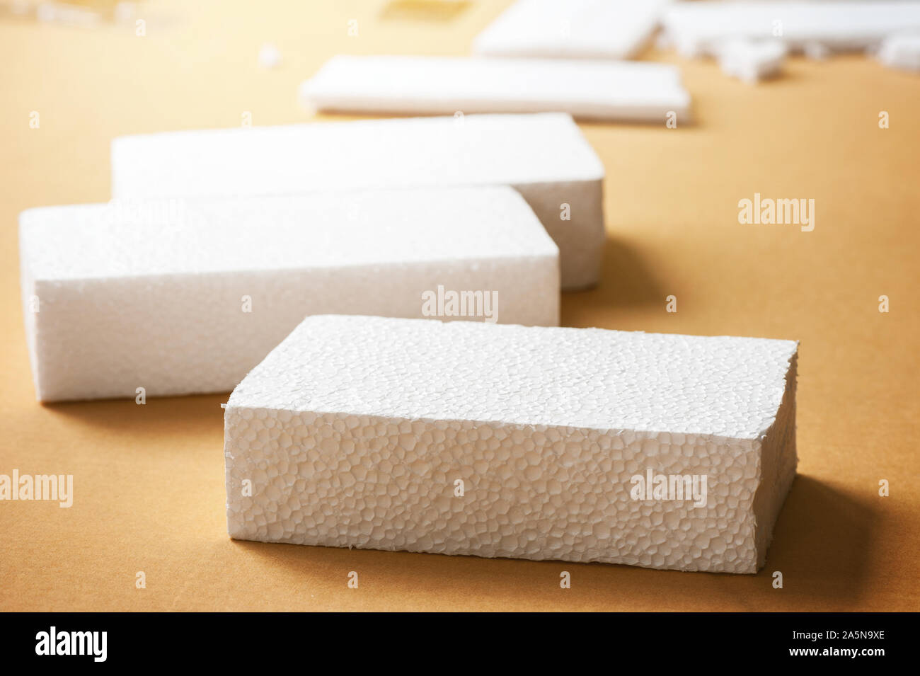 Closeup white polystyrene foam on the cardboard. Polystyrene foam is  cushioning material in packaging, material for craft applications and other  Stock Photo - Alamy