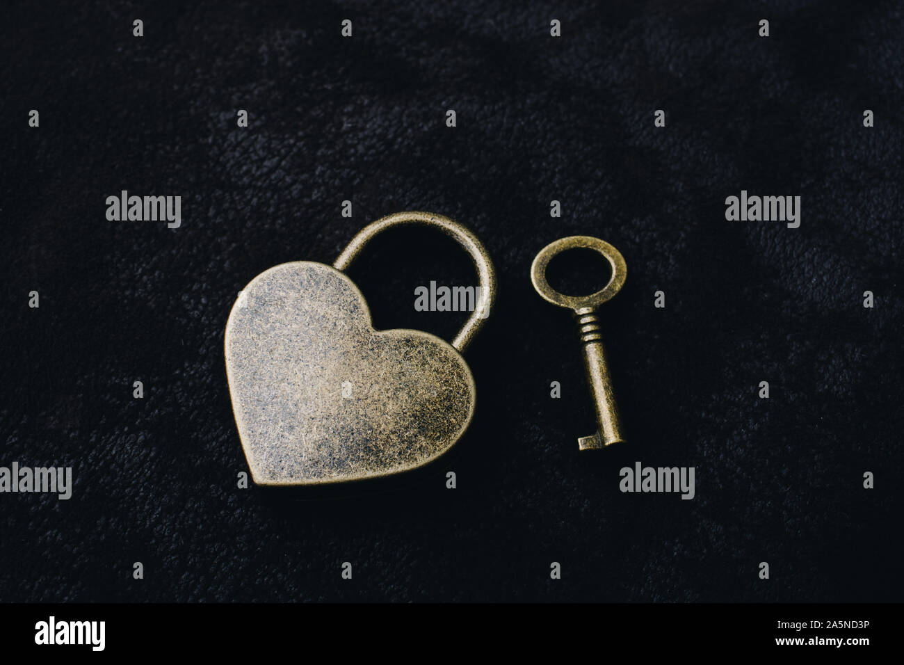 Metal padlock in heart shape as symbol of love Stock Photo - Alamy