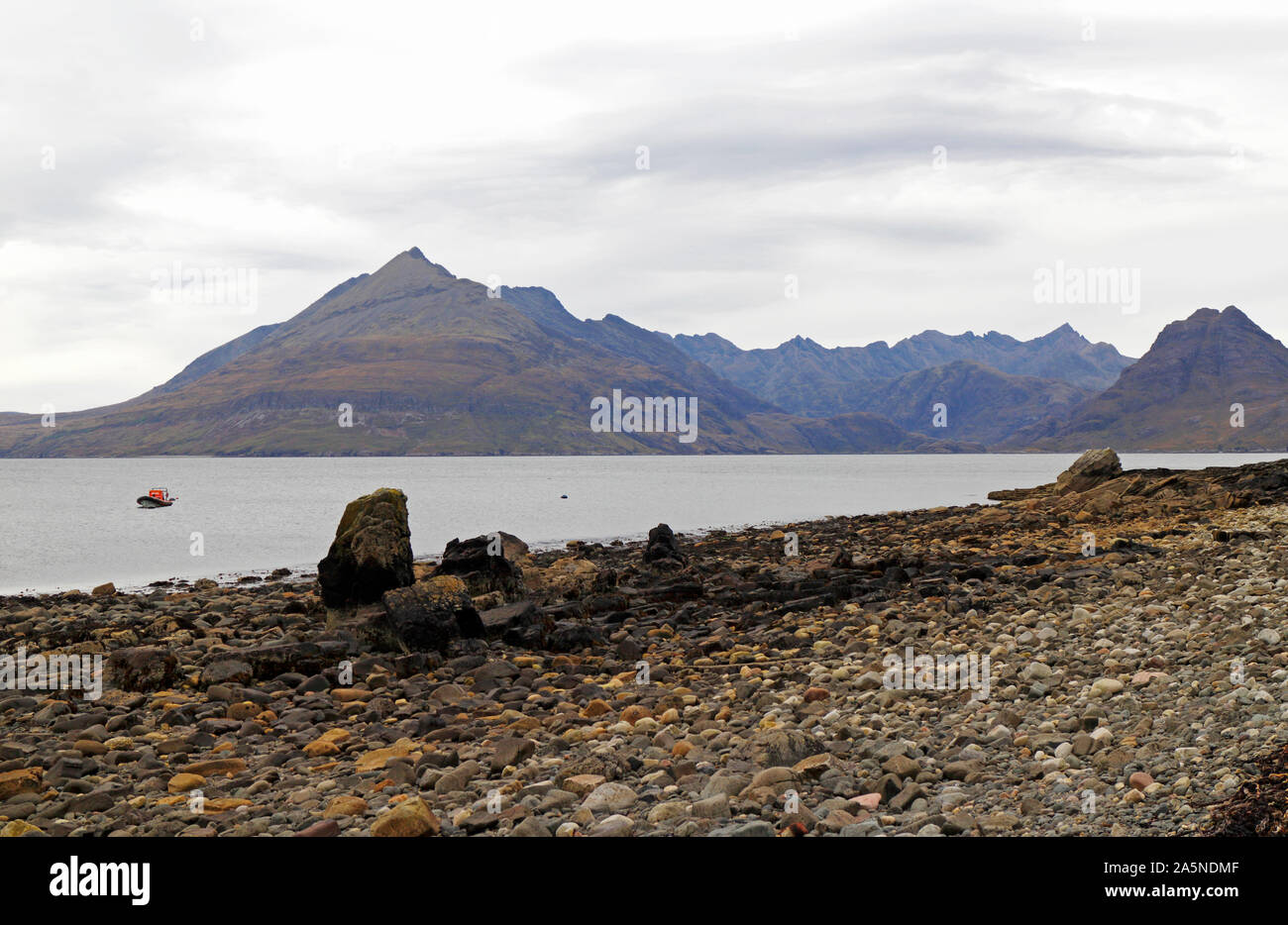 A view from the beach across Loch Scavaig to the Cuillin Hills from Elgol, Straithaird, Isle of Skye, Scotland, United Kingdom, Europe. Stock Photo