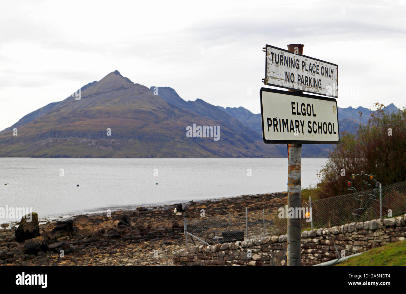 Signs in the village by the coast with the Cuillin Hills in the background at Elgol, Strathaird, Isle of Skye, Scotland, United Kingdom, Europe. Stock Photo