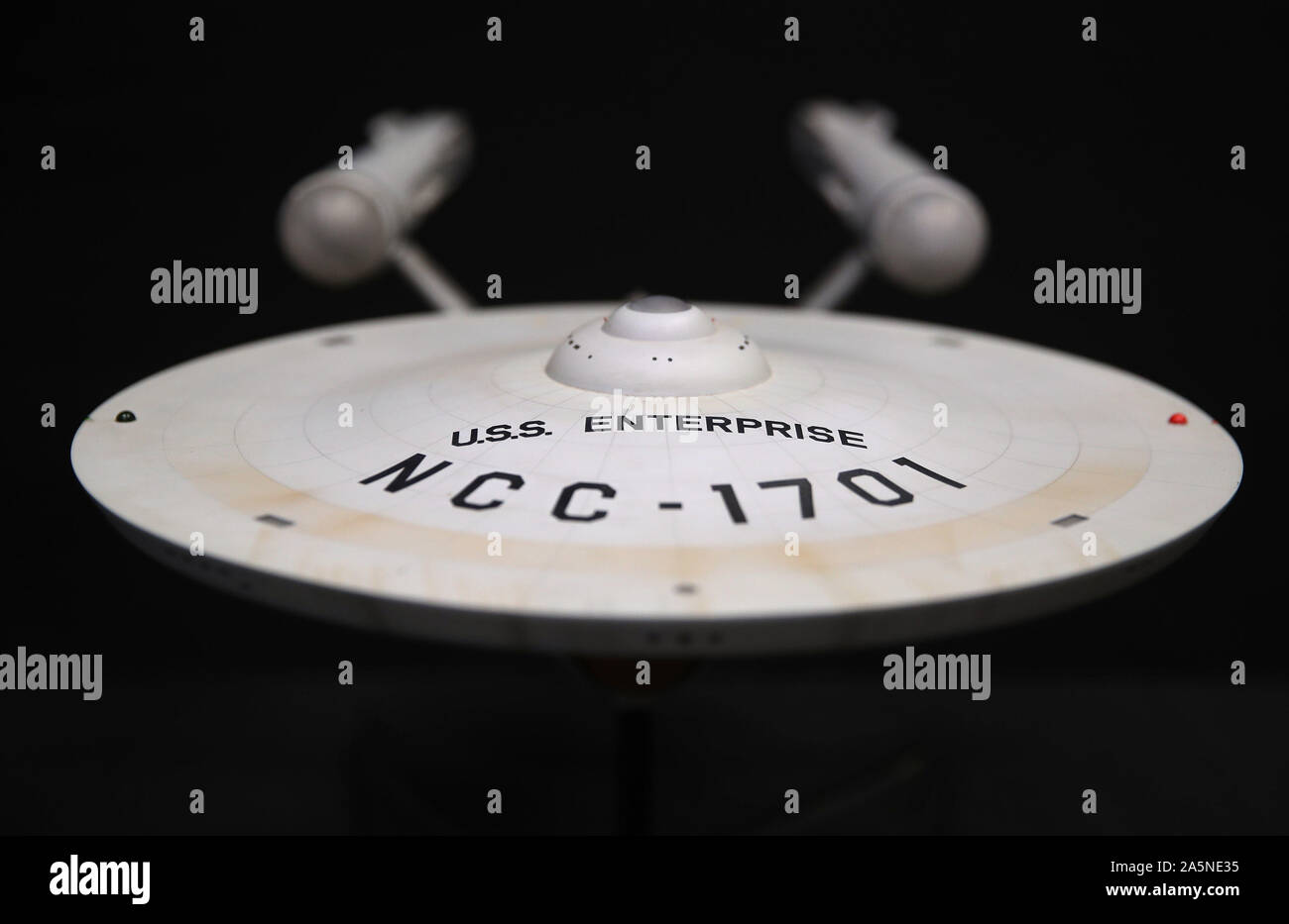 A model replica of the USS Enterprise NCC-1701 from Star Trek: The Original Series (estimate ??1,000 - ??2,000), during a preview for the Prop Store's forthcoming cinema poster live auction. Stock Photo