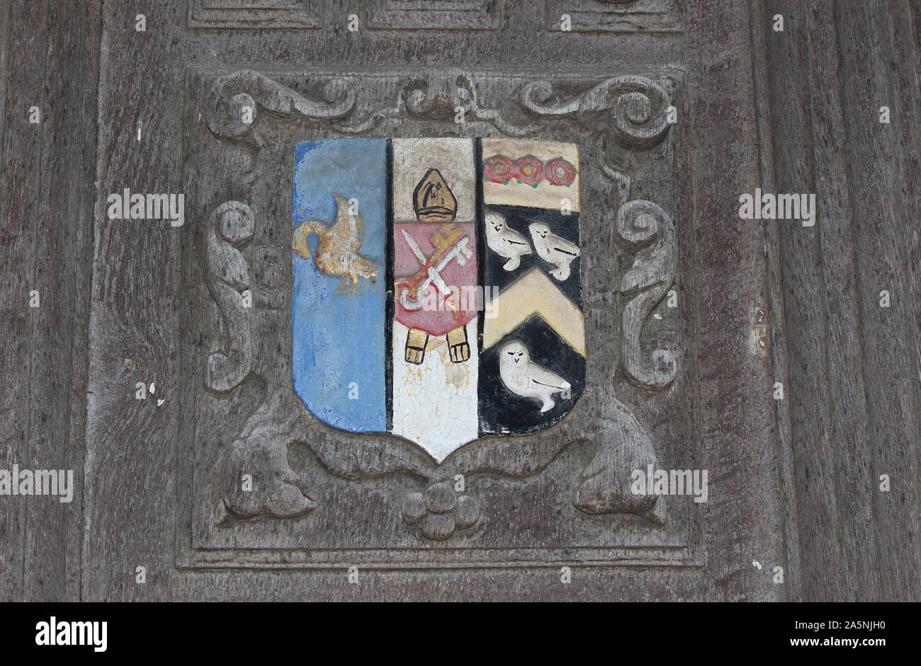 Coat of arms of Corpus Christi College Oxford University the badge or crest is carved or embossed on the Great Gate to the Bodleian library Stock Photo