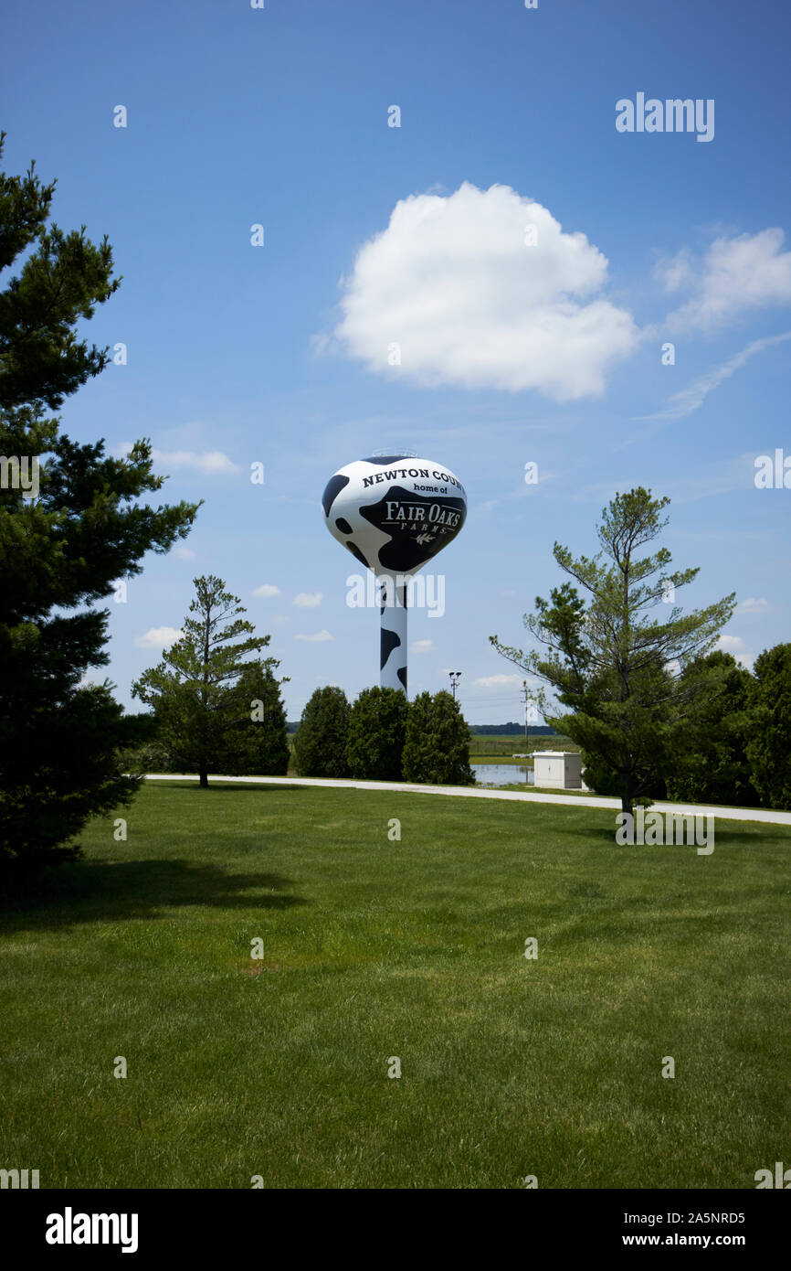 black and white painted water tower in newton county home of fair oaks