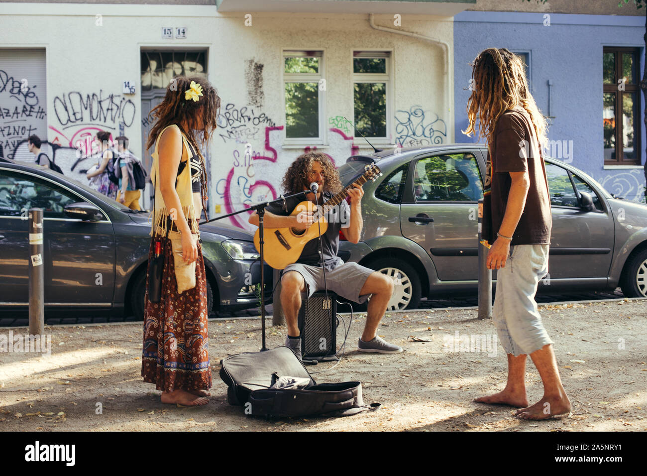 Hippies jamming on the street in berlin - busking Stock Photo