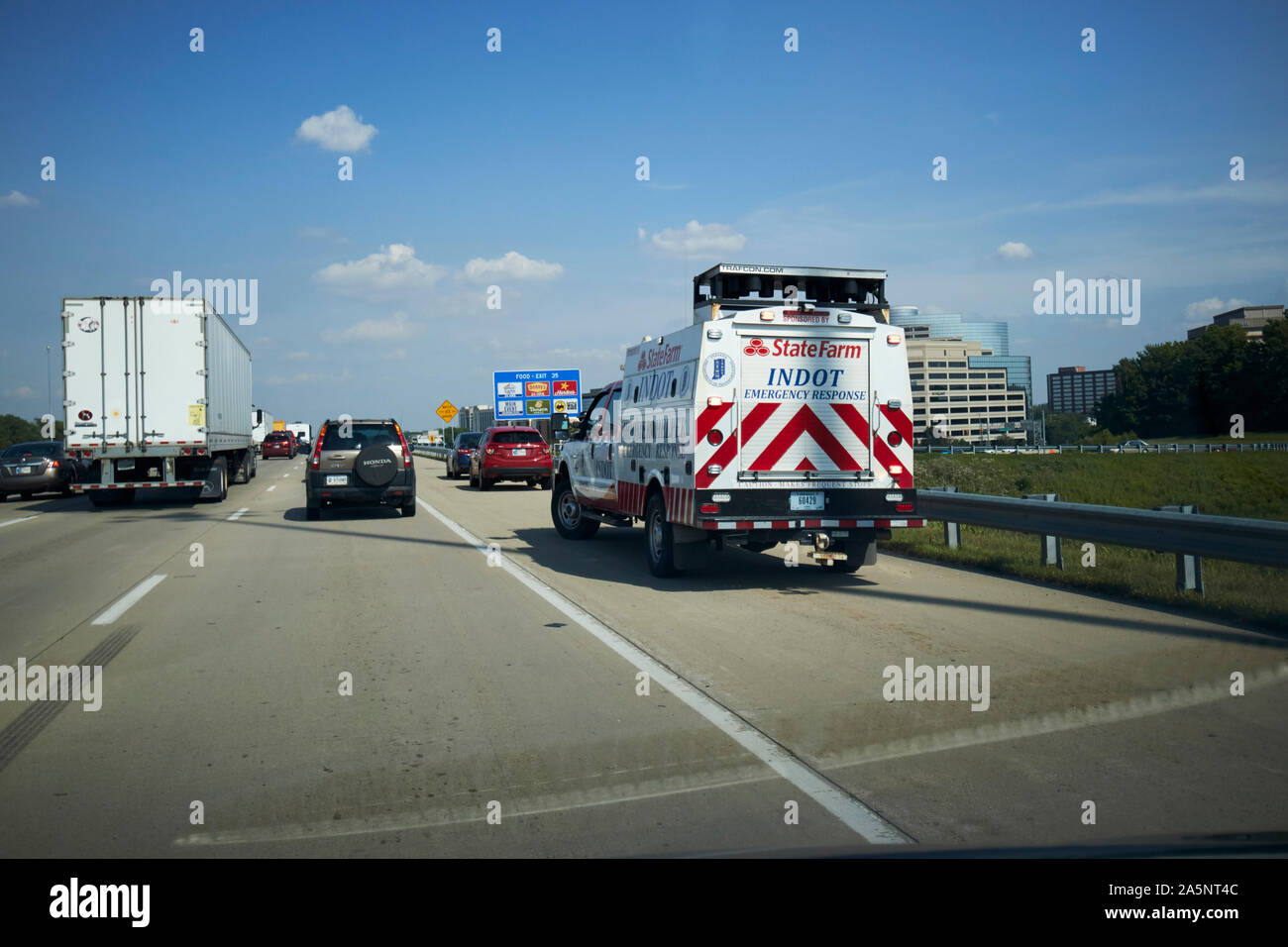 state farm indot emergency response hoosier helper vehicle on hard shoulder of interstate i-465 around indianapolis at rush hour indiana USA Stock Photo