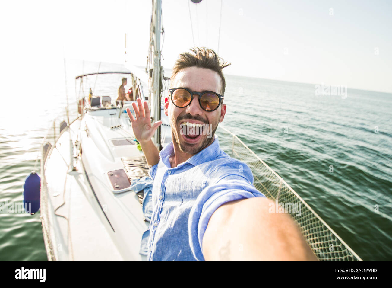 Portrait happy man sailing boat hi-res stock photography and images - Alamy
