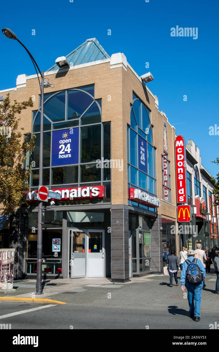 Victoria, British Columbia, Canada. People walking past a McDonald's
