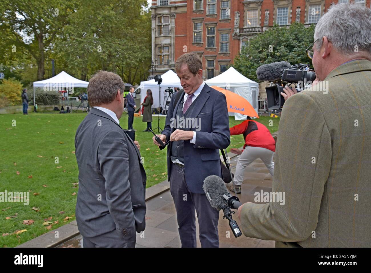 Andrew Bridgen MP, member of Conservative Brexit supporting ERG meets Alistair Campbell, remain campaigner on College Green, Westminster 21-10-19 Stock Photo