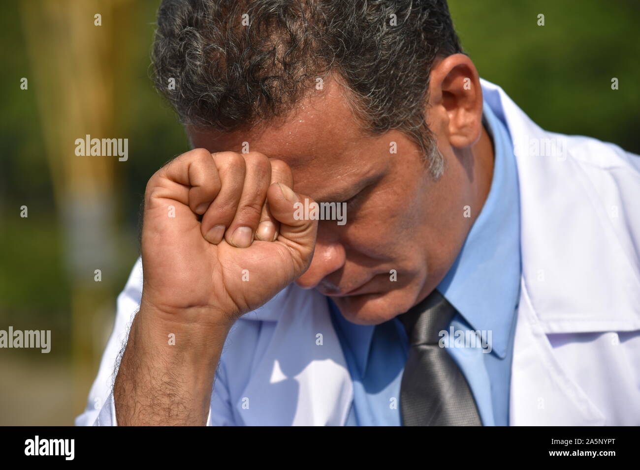 Depressed male doctor hi-res stock photography and images - Alamy