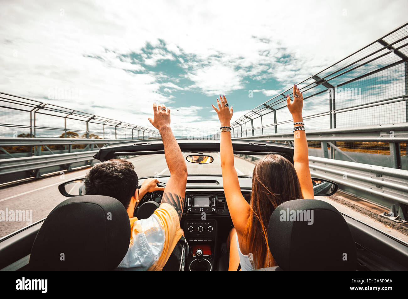 Two male friends driving open hi-res stock photography and images - Alamy