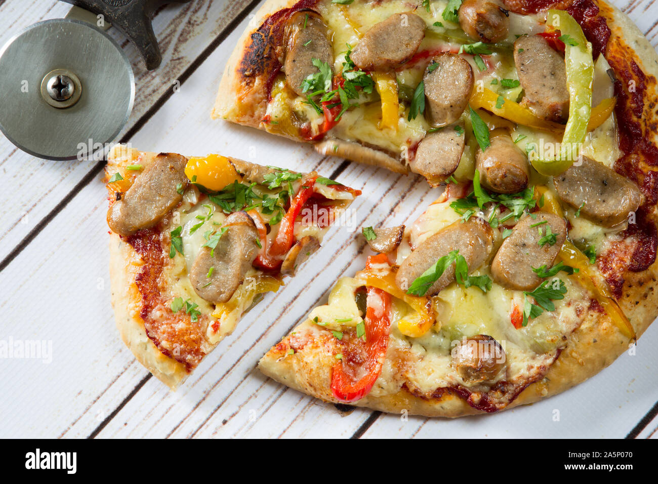 Sliced sausage pizza Stock Photo