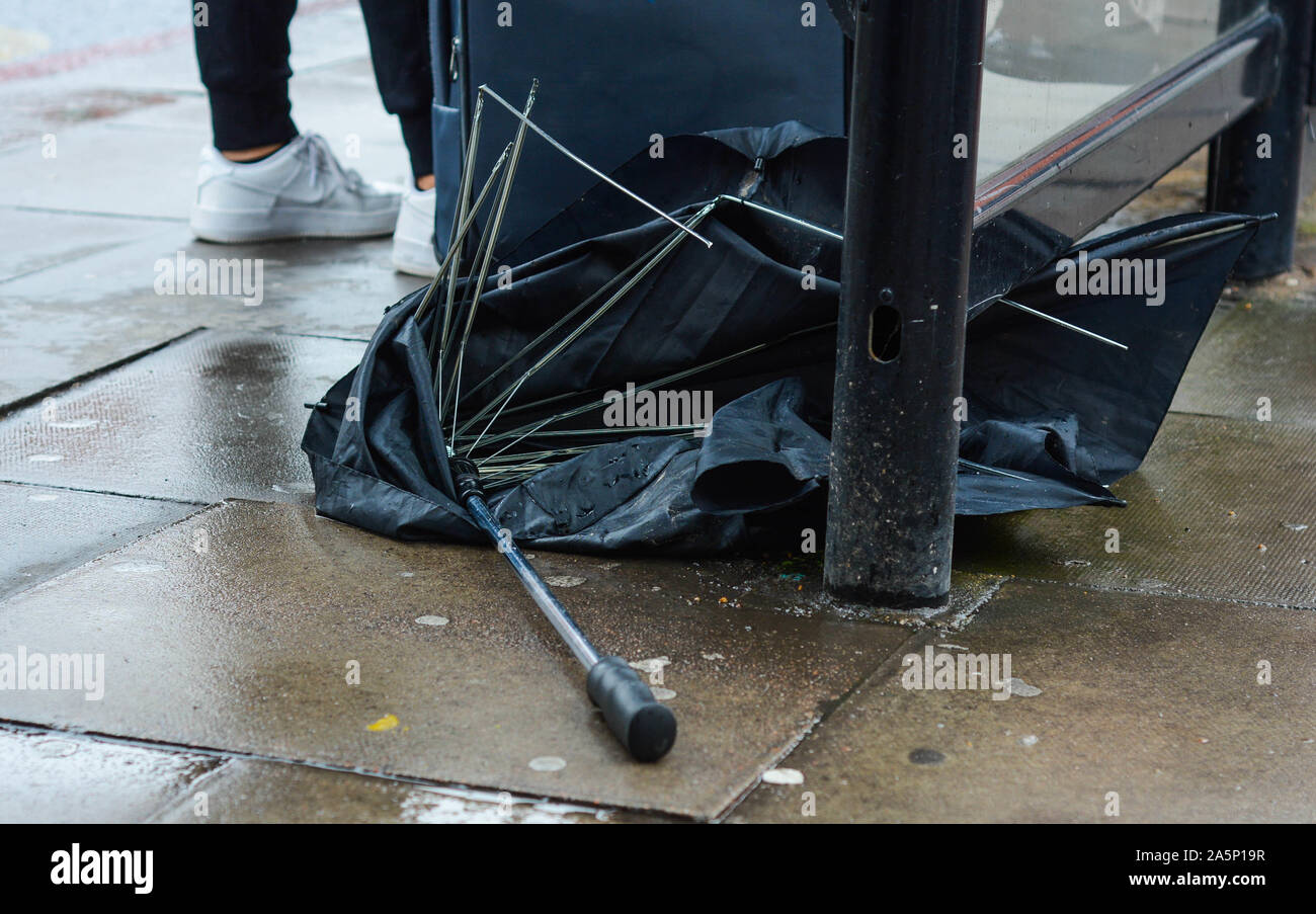 Strong wind umbrella hi-res stock photography and images - Alamy