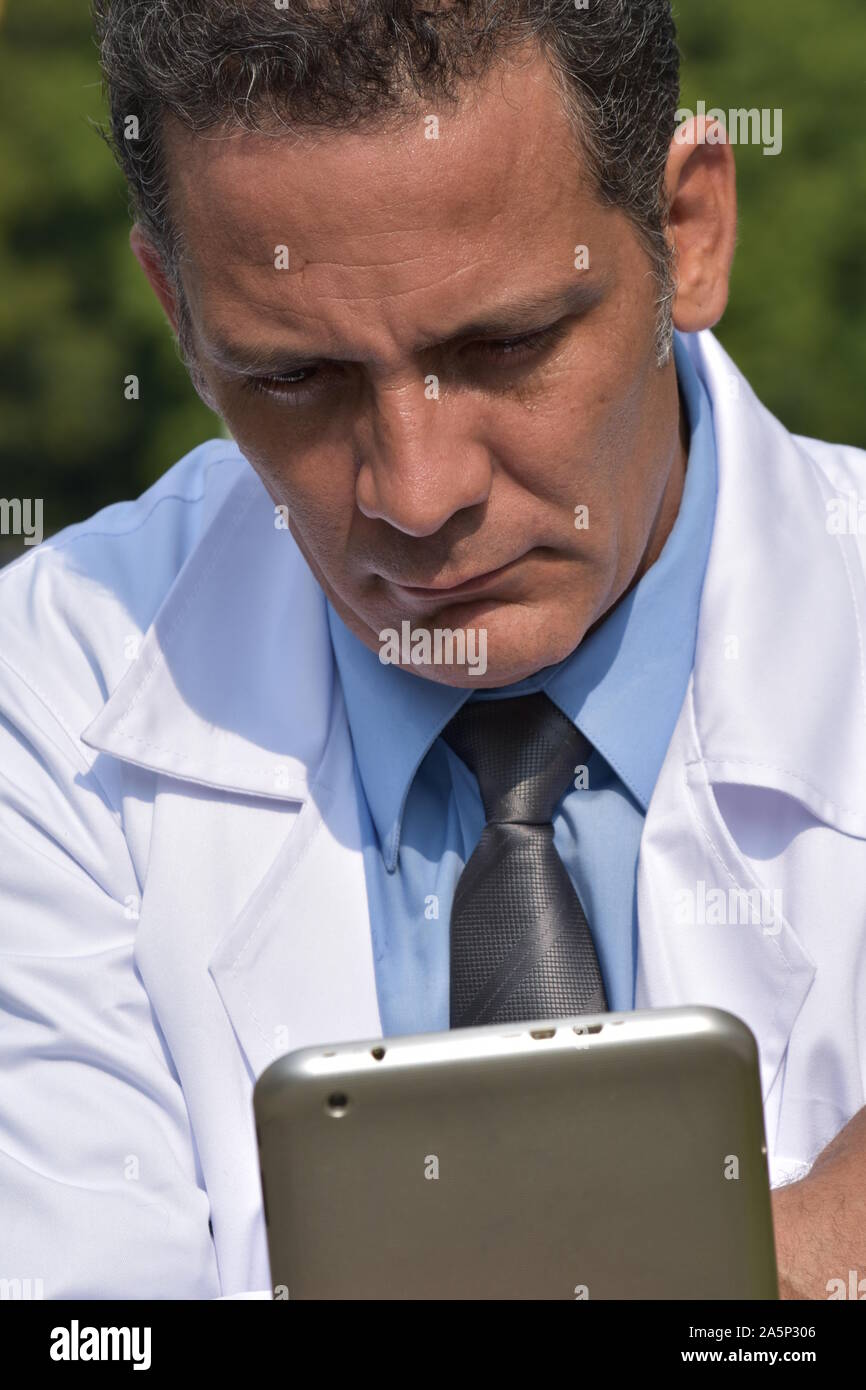 Serious hispanic doctor hi-res stock photography and images - Alamy