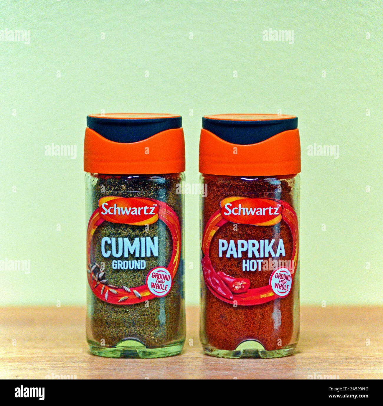 Jars of Schwartz Ground Cumin and Hot Paprika Spices. Ground from whole Stock Photo Alamy