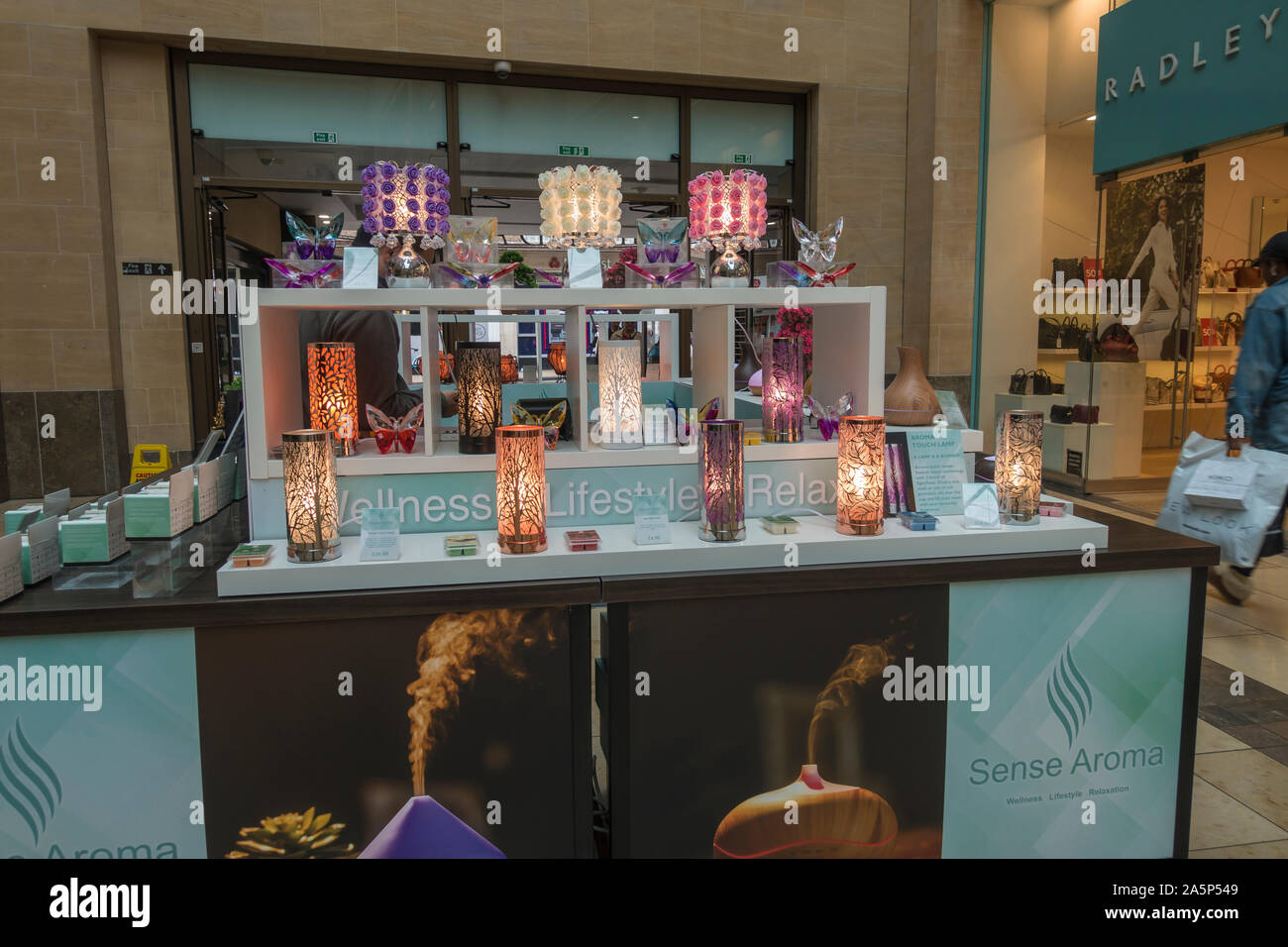 Aroma lamps on stand in ggrand arcade Cambridge 2019 Stock Photo