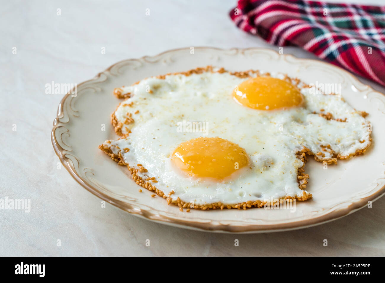 Sesame Seeds with Fried Eggs for Breakfast. Organic Food Stock Photo ...