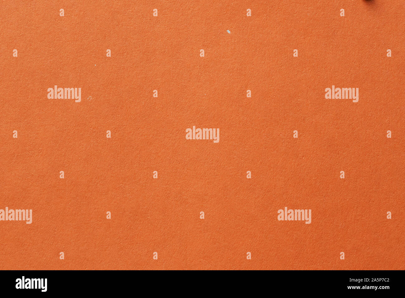 Yellow color cardboard. Clean orange paper texture. a high resolution photo. Empty orange backgrounds. Stock Photo