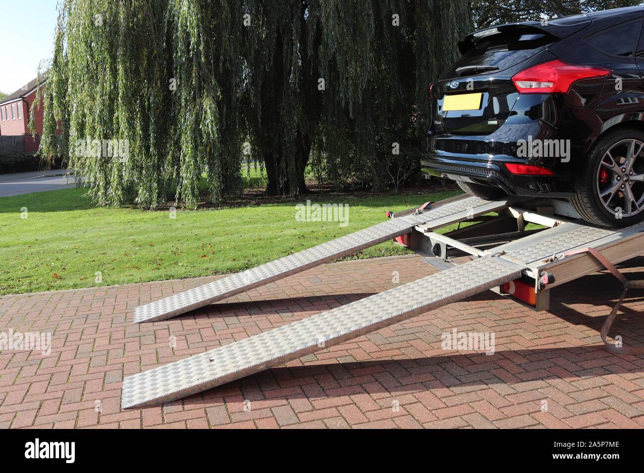 Car recovery service pulls and winch for car recovery.broken down