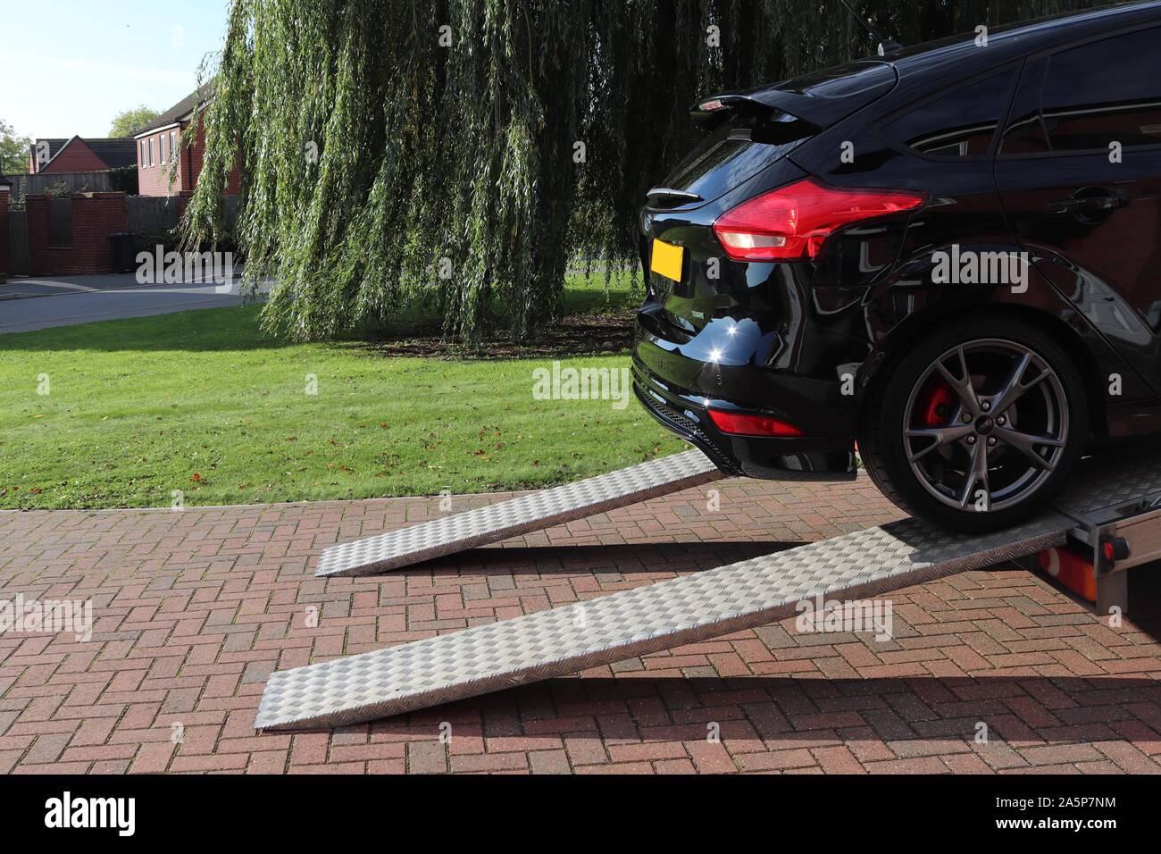 Car recovery service pulls and winch for car recovery.broken down