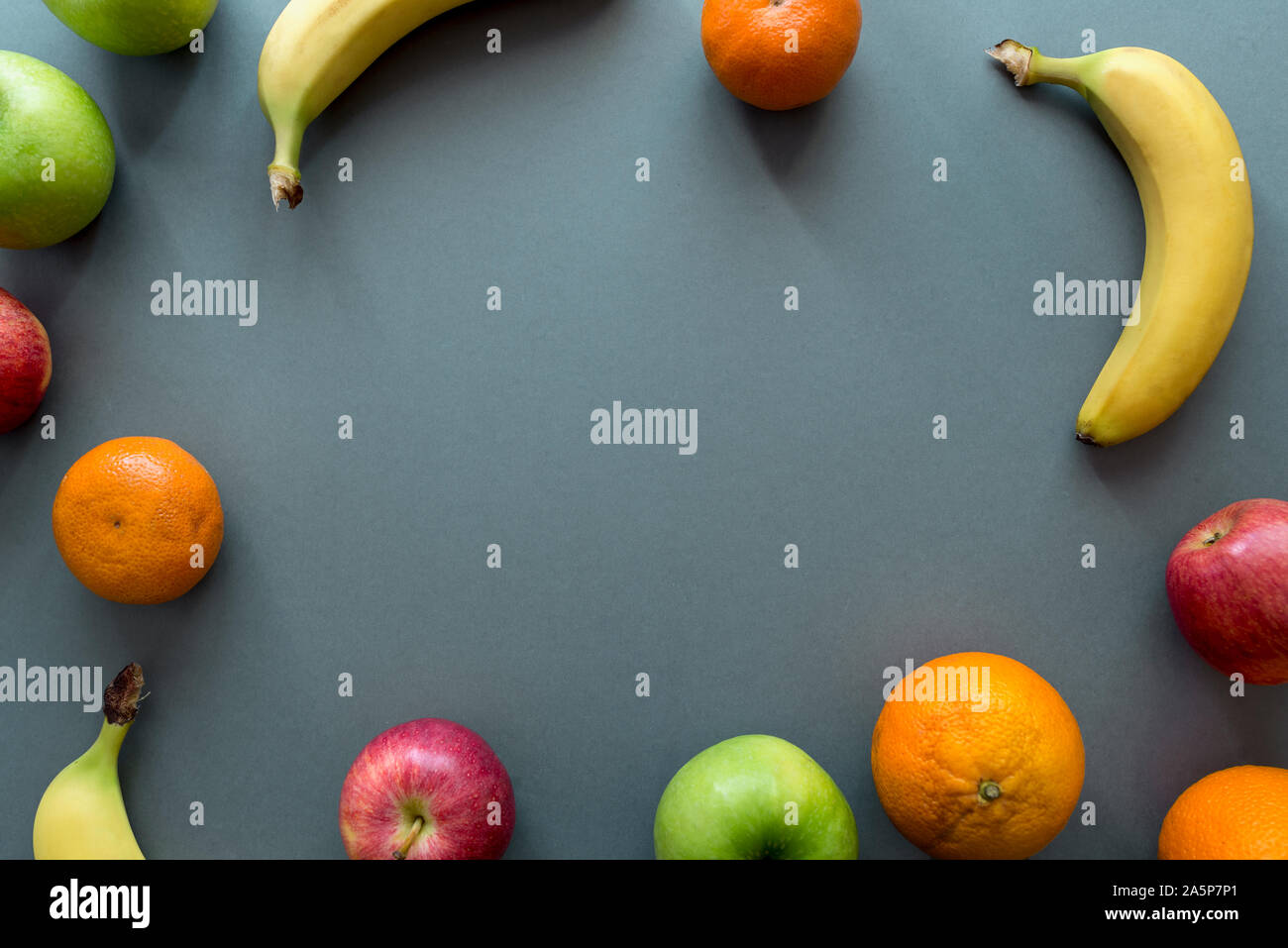 Fruits on grey background Stock Photo