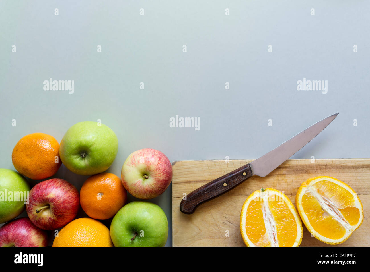 Fruits on grey background Stock Photo