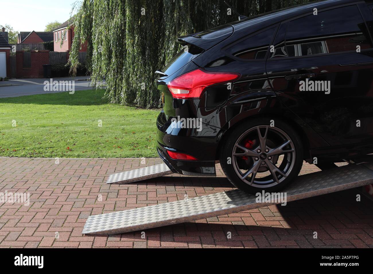 Car recovery service pulls and winch for car recovery.broken down