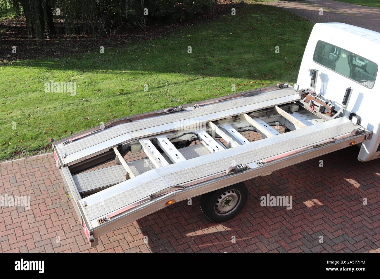 Car recovery service pulls and winch for car recovery.broken down