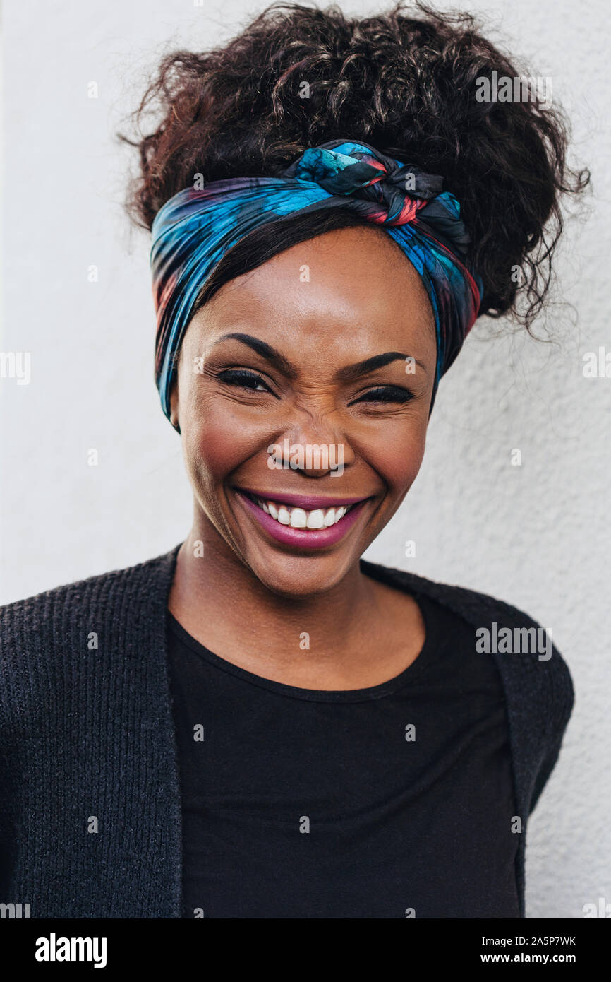 Woman dark hair smiling hi-res stock photography and images - Alamy