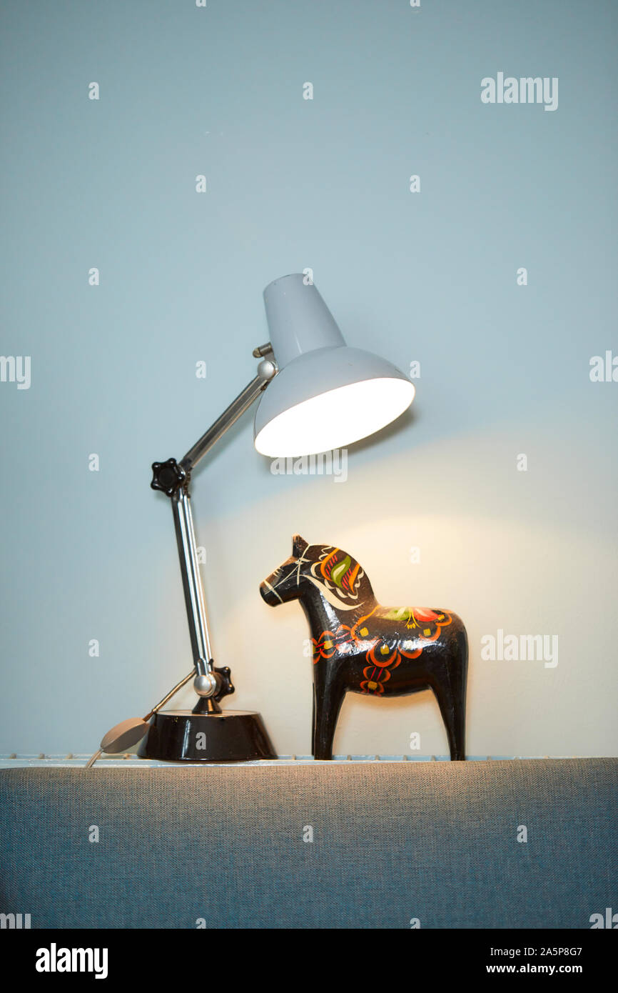 Dala horse and table lamp Stock Photo