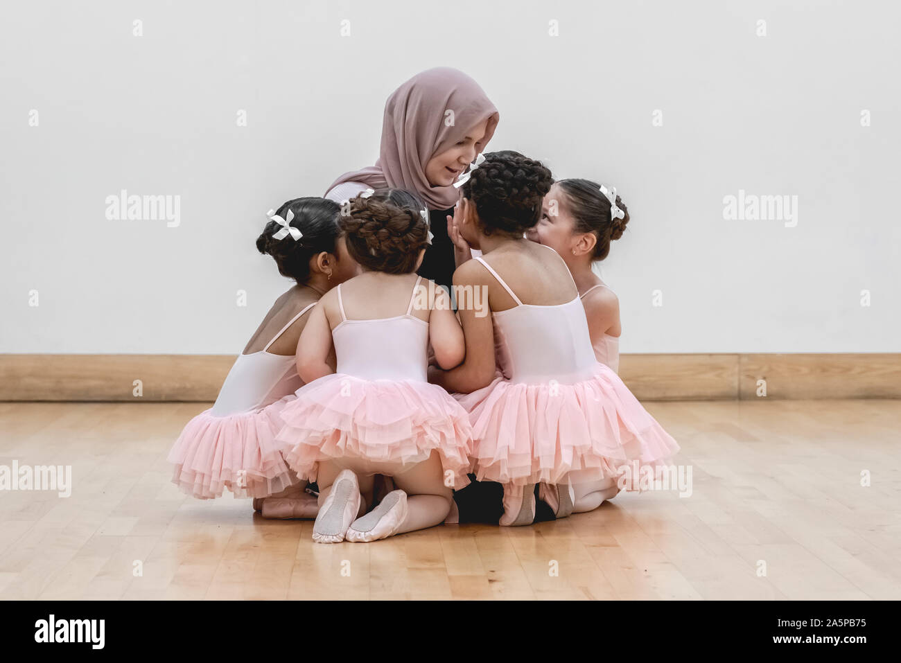 London, UK. 22nd Oct, 2019. World Ballet Day: Muslim Ballet School. Grace & Poise Academy. Founded in Jan 2019 by Maisie Alexandra Byers(pictured), a graduate of the Royal Academy of Dance and Dr Sajedah Shabib, business director, Grace & Poise Academy is the world’s first ballet school bringing ballet to the Muslim community.   Young dancers pictured no order: Marym 4yrs, Halimah 4yrs, Safiyyah 5, Evi 5. Credit: Guy Corbishley/Alamy Live News Stock Photo