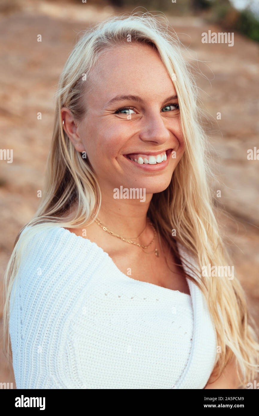 Blonde white dress woman hi-res stock photography and images - Alamy
