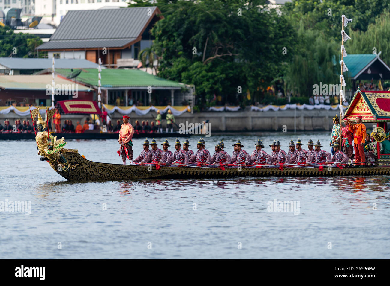 Bangkok, Thailand - October 21, 2019: Thai royal barges participate in a procession on Bangkok's Chao Phraya River. Stock Photo