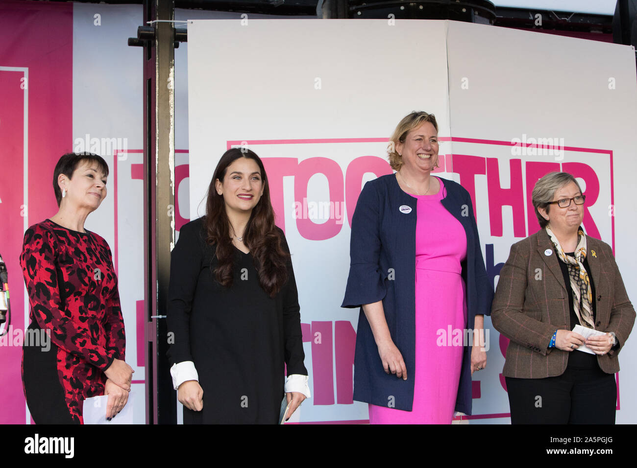 Westminster, London, UK. 19 October 2019. (L to R) Caroline Lucas Green Party, Luciana Berger MP Liberal Democrat, Antoinette Sandbach MP Independent Group and Jo Cherry MP SNP wait on stage ready to address the rally on Parliament Square. MPs have just voted in favour of Oliver Letwin MP amendment to the government’s Brexit Deal. Hundreds of thousands supporters of the 'People's Vote' converge on Westminster for a ‘final say’ on the Prime Minister Boris Johnson’s new Brexit deal. Stock Photo