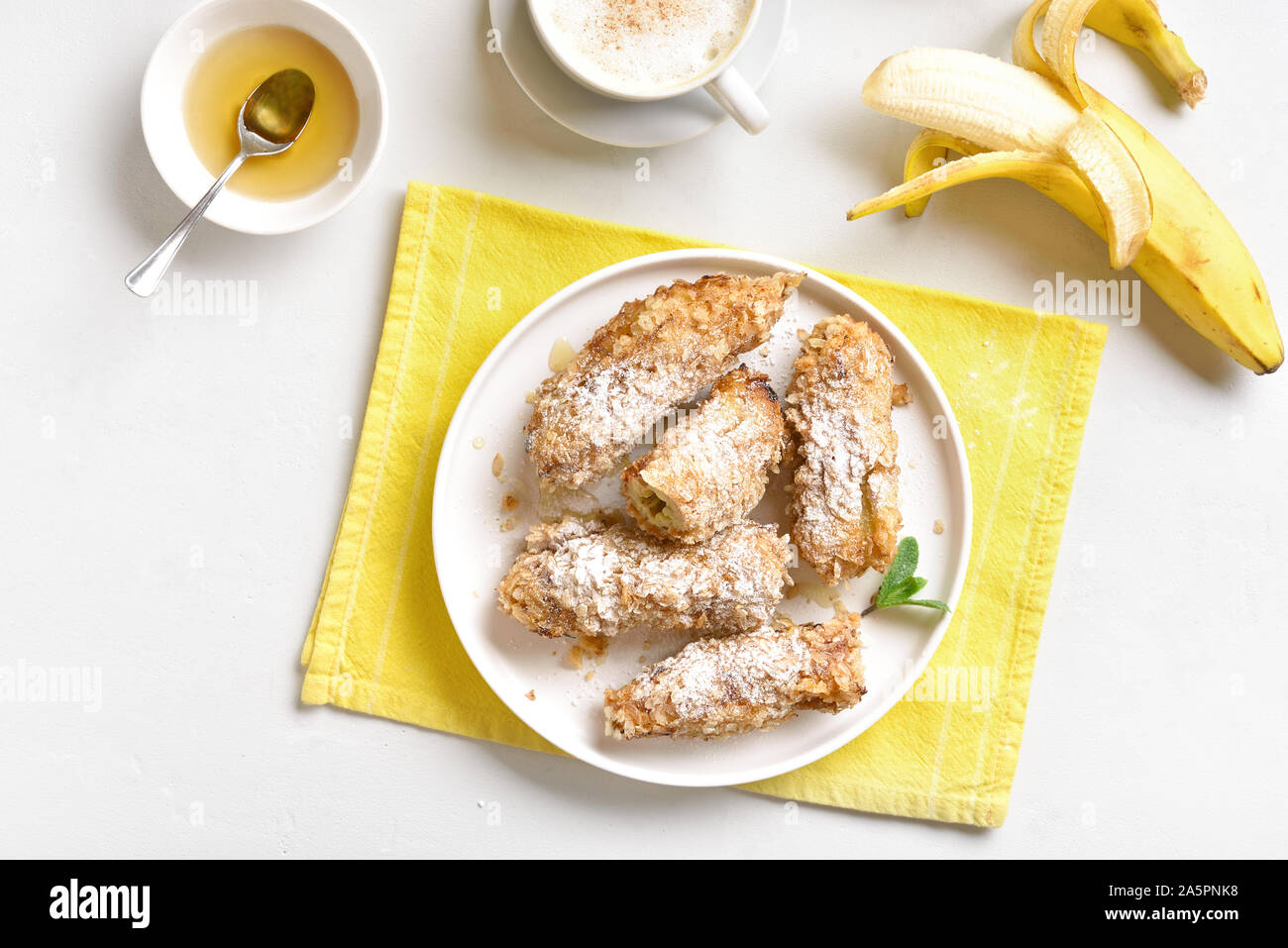 Tasty dessert from pan fried bananas in asian style. Deep fried bananas