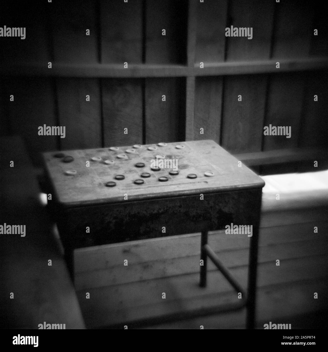 Black and white picture of checker game table shot with a diana camera. Stock Photo