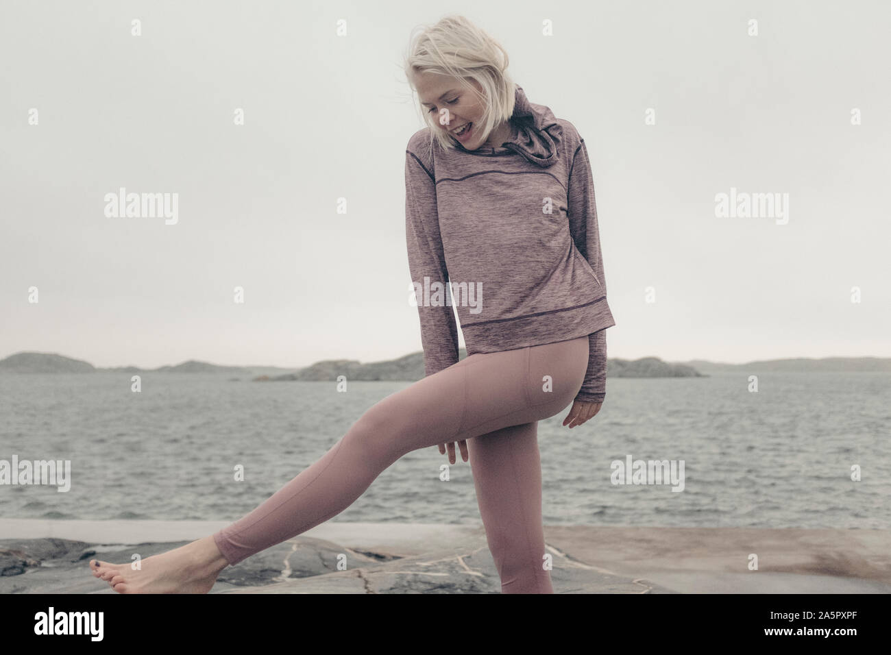 Agile young woman doing hi-res stock photography and images - Alamy