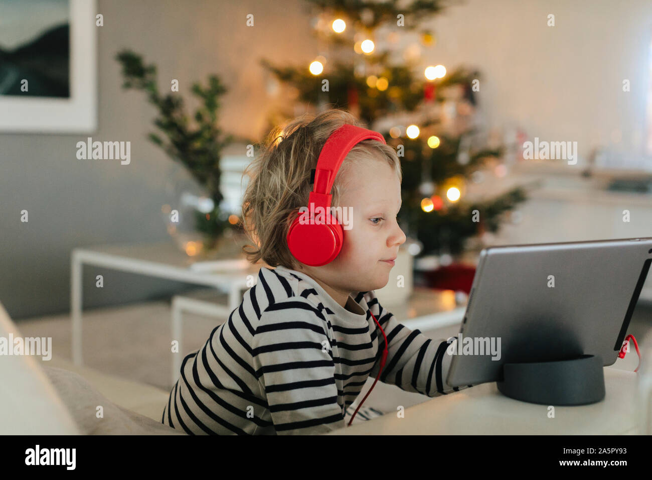 Boy using digital tablet Stock Photo