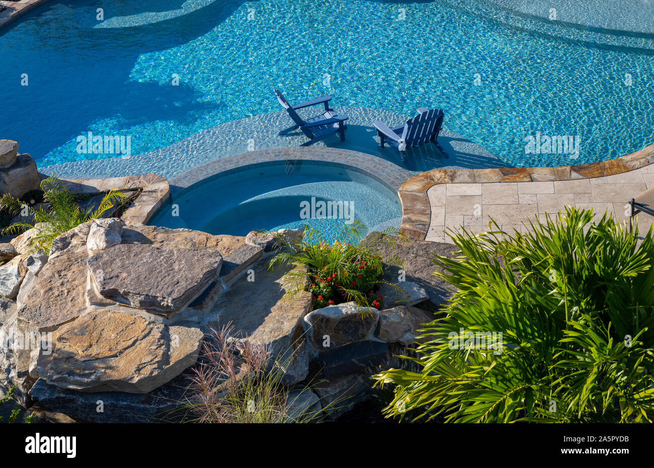Two Adirondack Chairs in the swimming pool Stock Photo Alamy