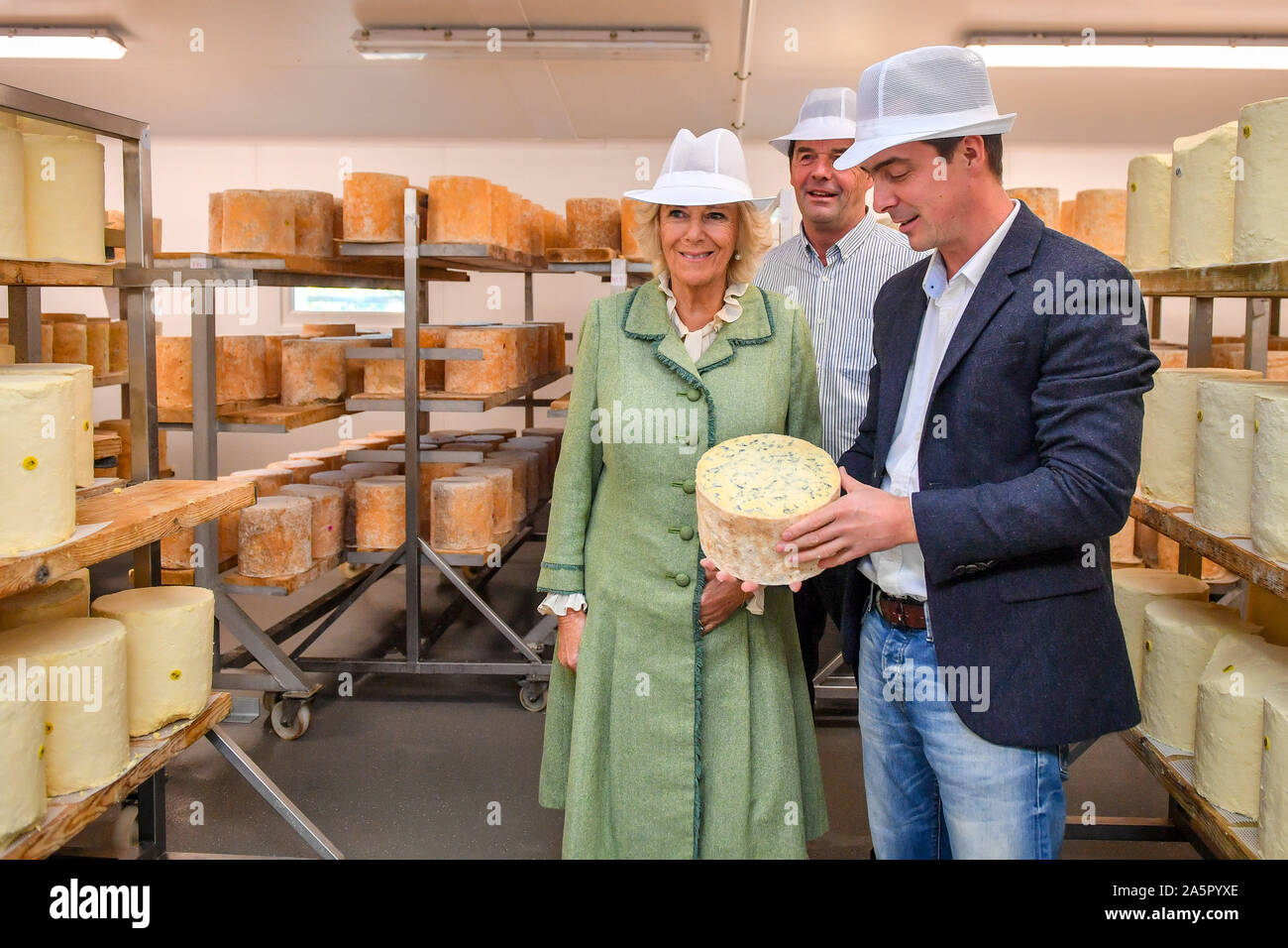 The Duchess of Cornwall is shown a blue cheese by Hugh Hadfield during