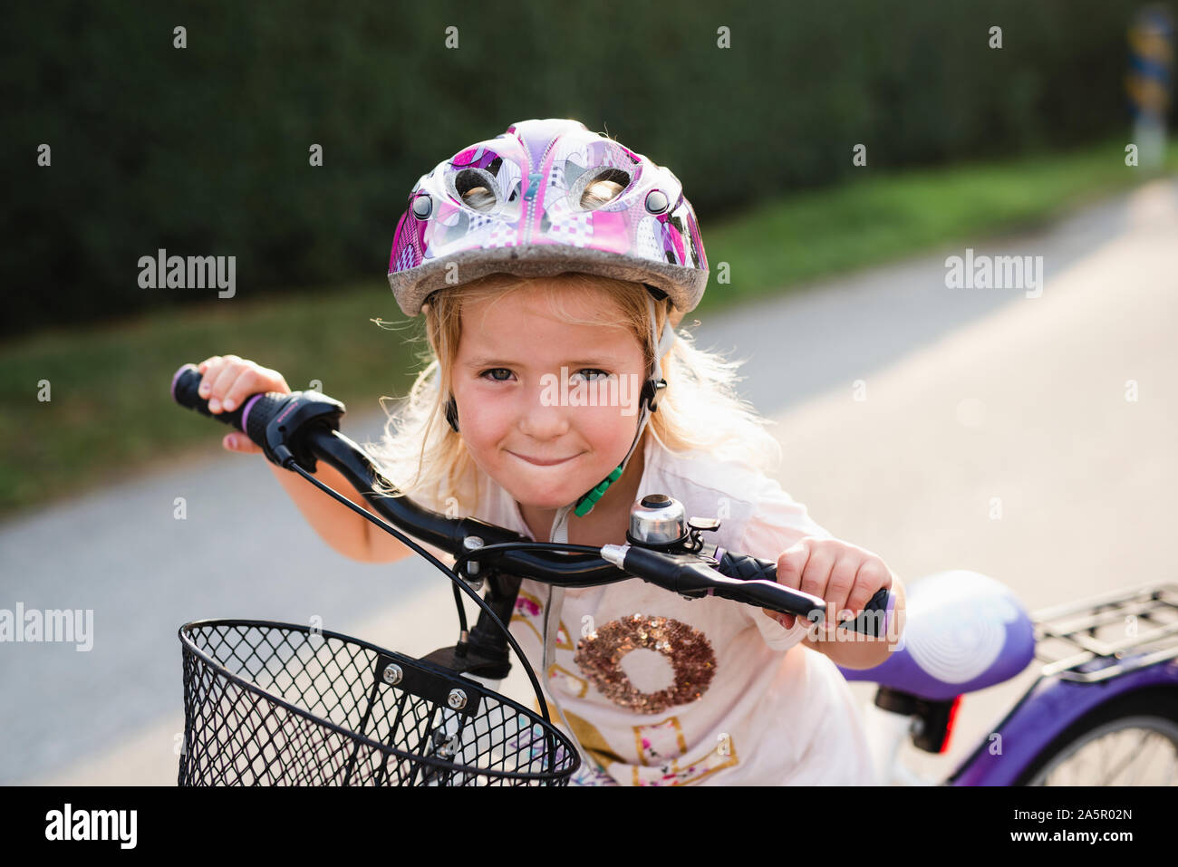 Girl on bicycle Stock Photo